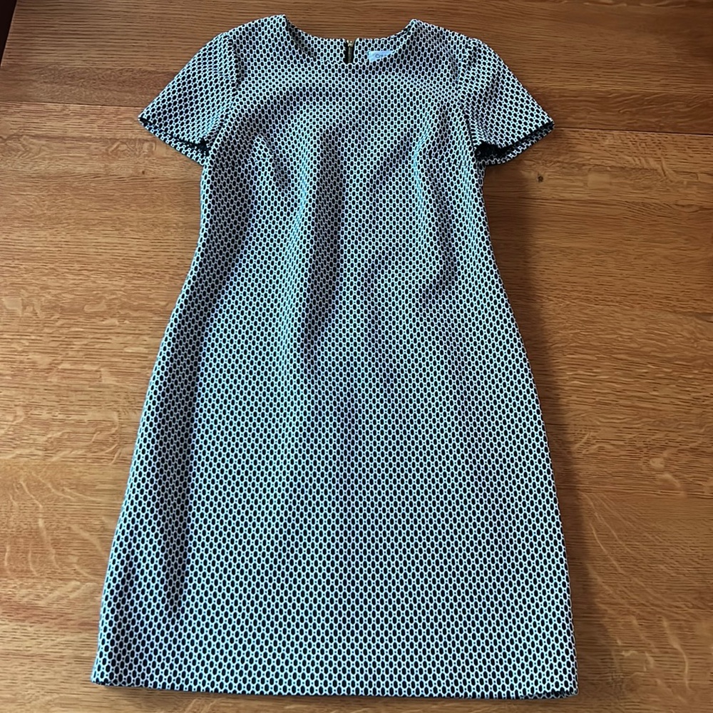 I am selling a Calvin Klein dress in a size 4.